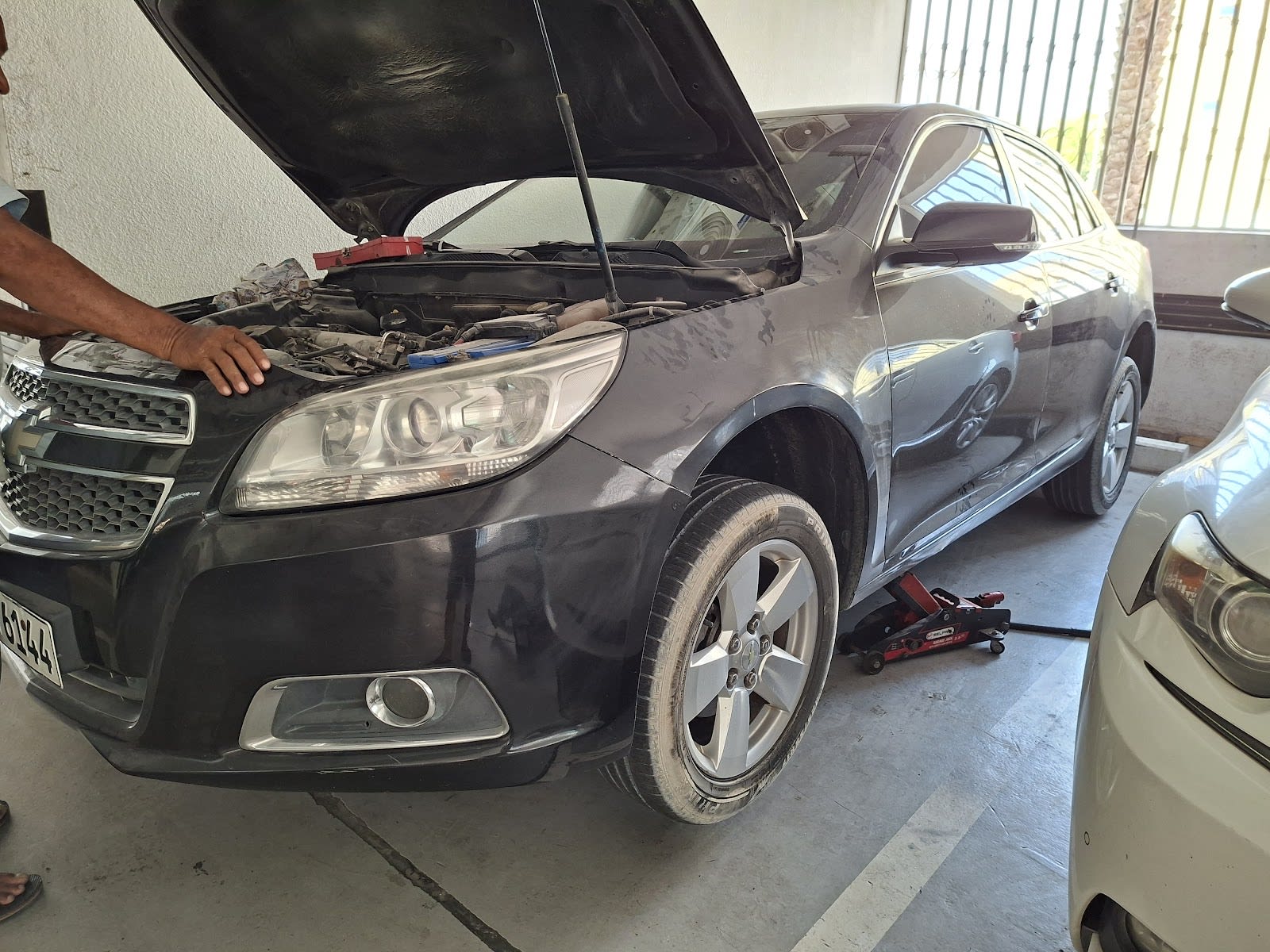 Car Repair & Battery Fixing At Home Service — Car battery store in Dubai