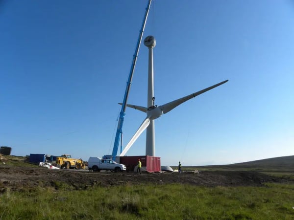 Installing a wind turbine.