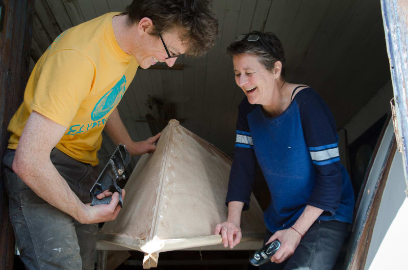 boatbuilders working on the boat
