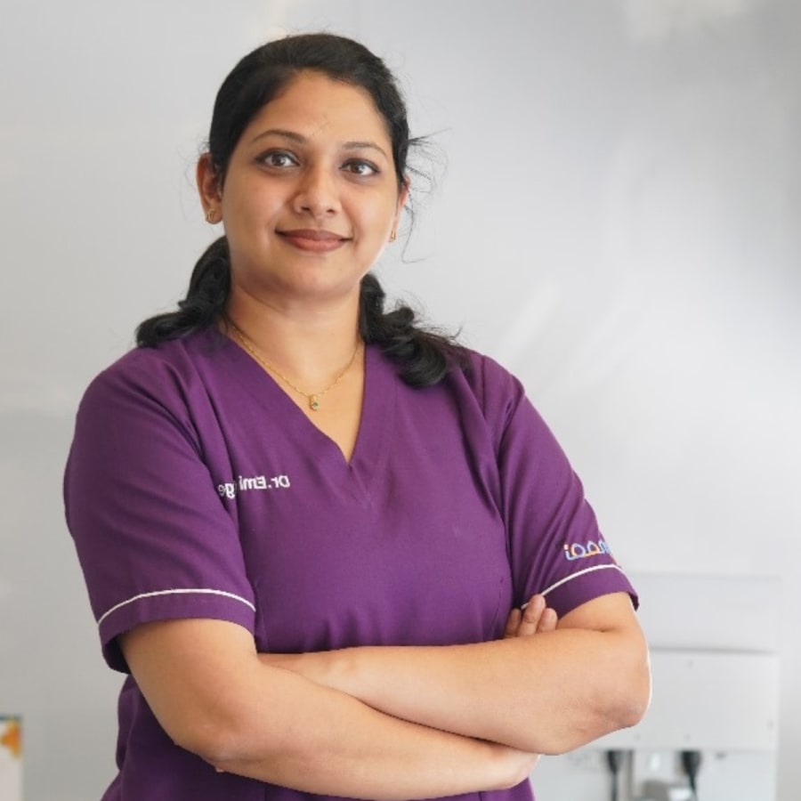Portrait of Dr. Emi George, dental surgeon at Lemooi