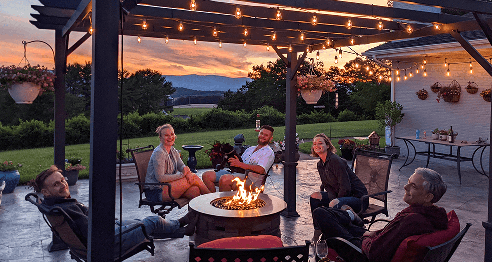 Group enjoying time together under your pergola