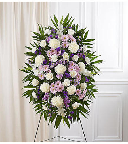 Lavender & White Sympathy Standing Spray Spray on easel in