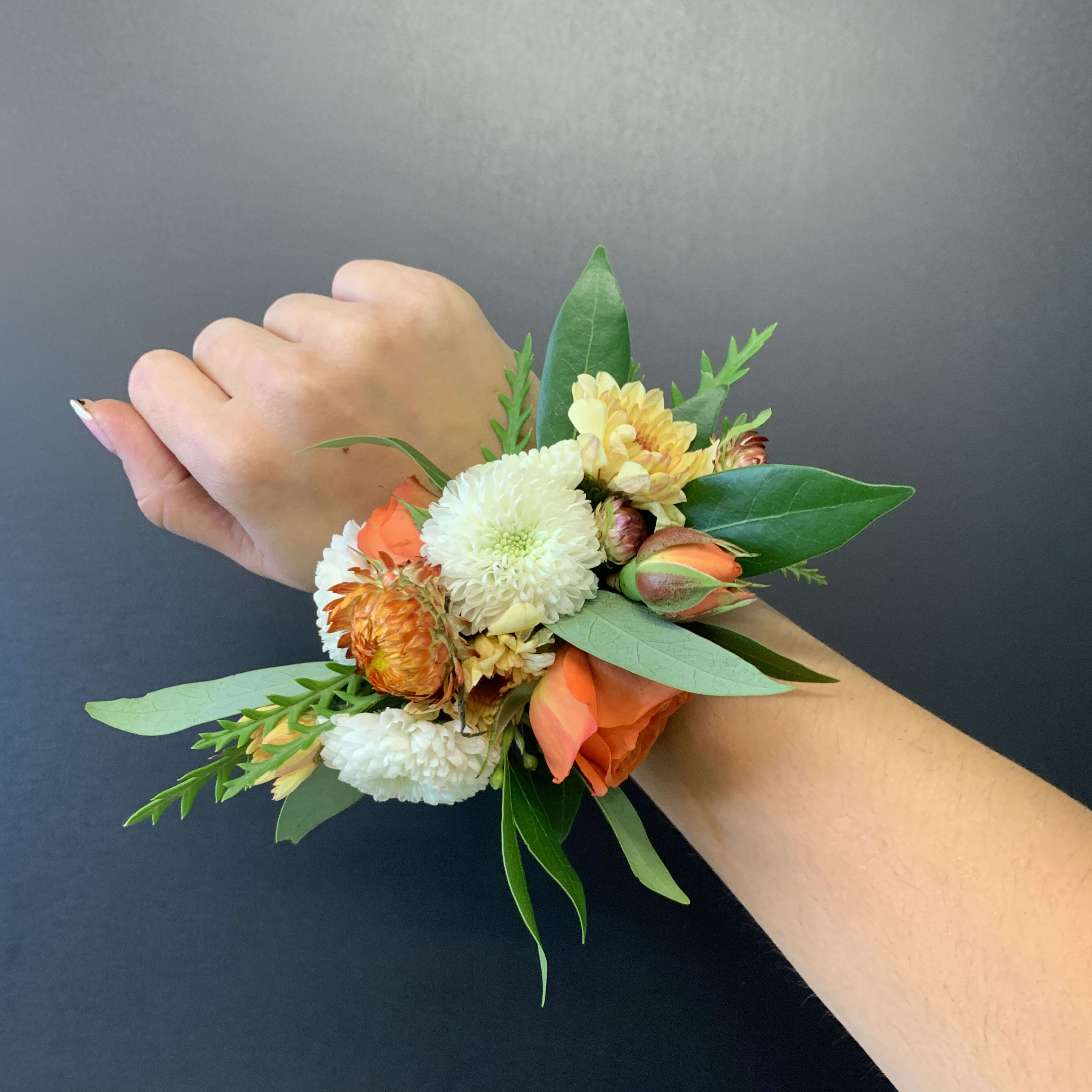 Wrist corsage (orange and white)