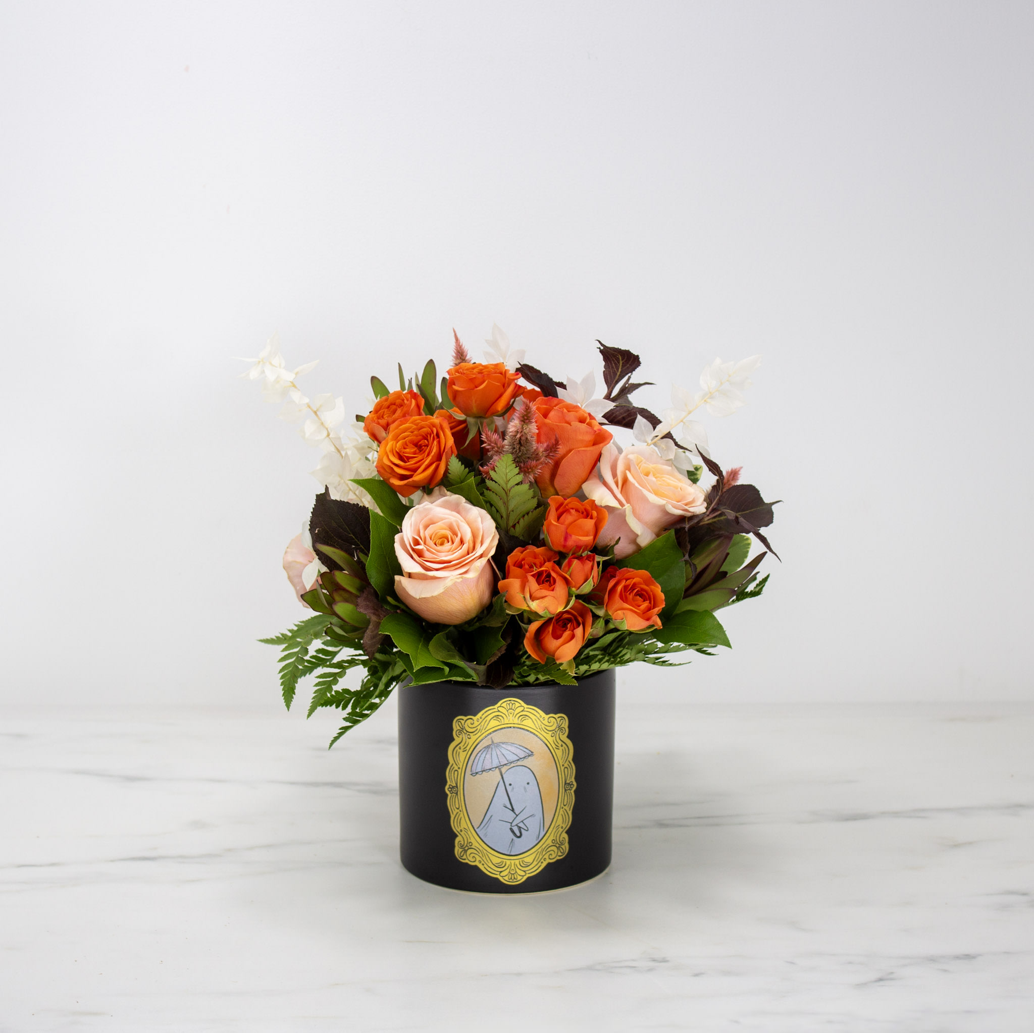 Vibrant Peach and Orange Floral Arrangement