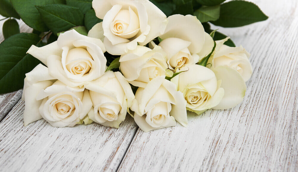white rose - Classic white rose funeral flowers arrangement for bereavement tribute
