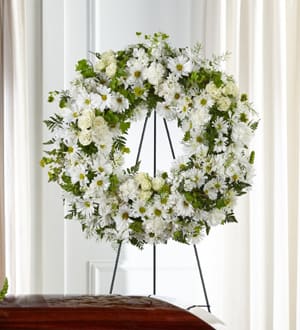 The FTD Faithful Wishes Wreath Flower Bouquet