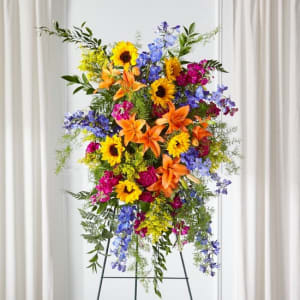 The FTD Sunlit Memories Standing Spray Flower Bouquet