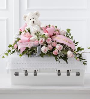 The FTD® Touch of Sympathy™ Casket Spray Flower Bouquet