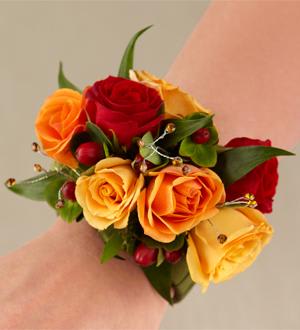 The FTD® Sweet Sunshine™ Wristlet Flower Bouquet