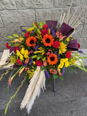 Vibrant Reflections Casket Spray Flower Bouquet