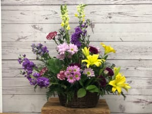 Celebrate the Day Basket in Yellow and Purple Flower Bouquet