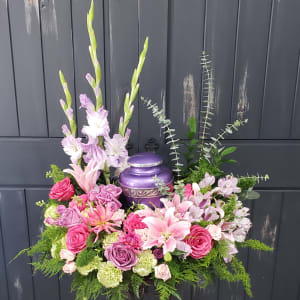 A Beautiful Lady Urn Surround Flower Bouquet