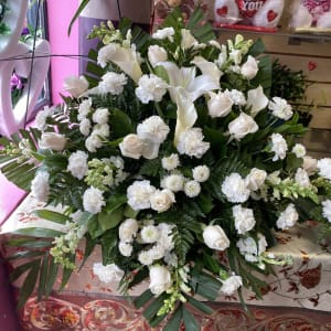 All white casket with arum-lily Flower Bouquet
