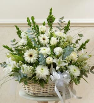 White Sympathy Arrangement in Basket Flower Bouquet