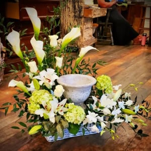 White Urn Surround with Calla Lily Flower Bouquet