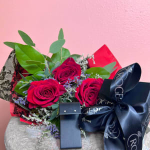 Three wrapped roses and Jewelry package