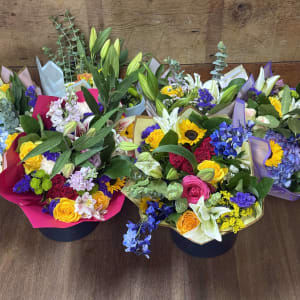 Designer's Choice Bouquet  Wrapped In Colored Paper