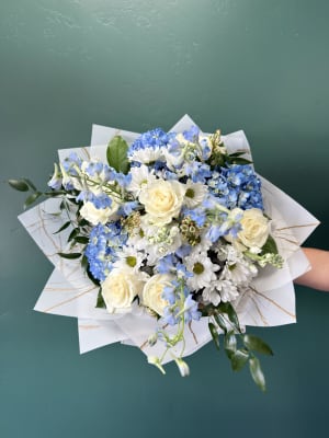 Shoreside Blooms Wrapped By Elite Flower Bouquet