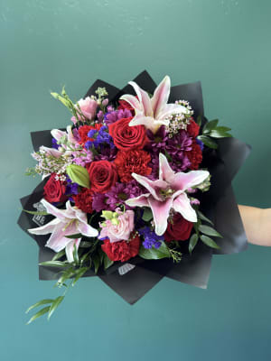Romantic Antics Wrapped By Elite Flower Bouquet