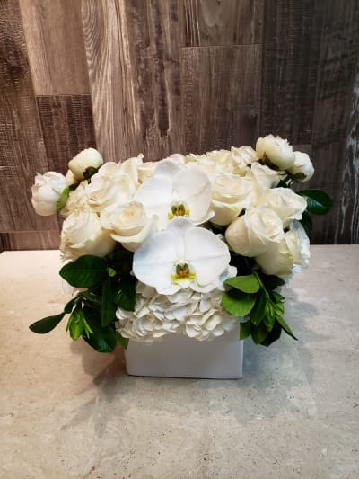 Buy Congratulation Floral Stand of Roses and Orchids online by www