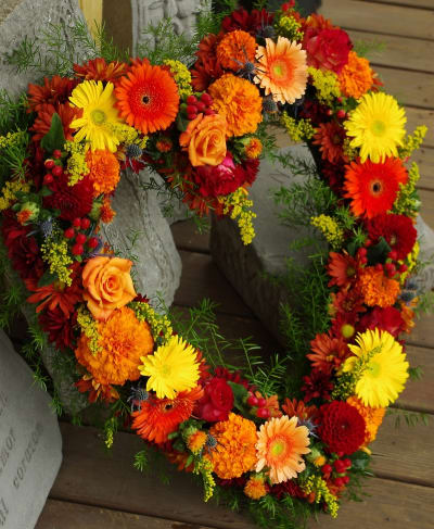 Heart Wreath in Sunflowers in Walpole MA - Flowers & More Design Studios