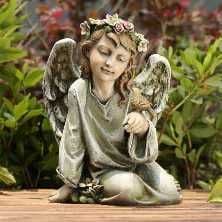 Sitting Angel with Bird