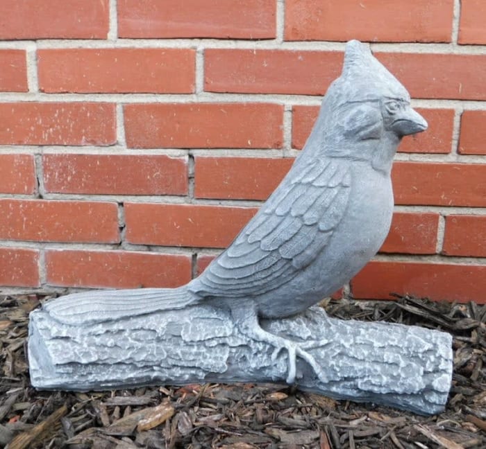 Cardinal on Log Stone Statue