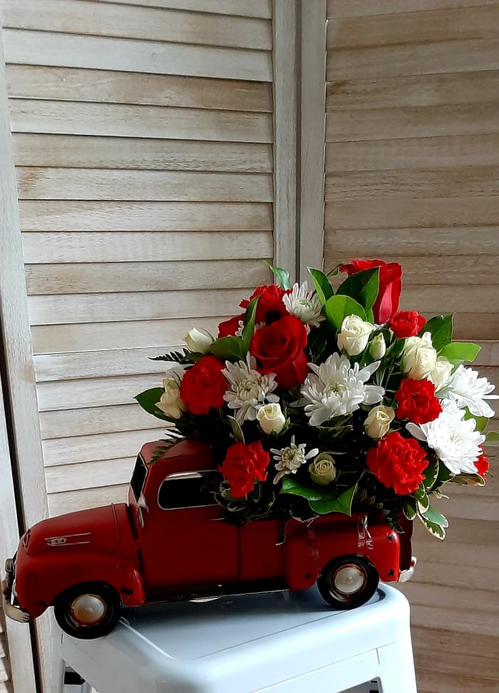 Antique Truck With Custom Floral Arrangement