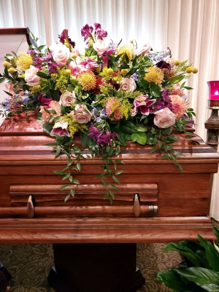 Funeral Flowers - Call us to design a unique tribute to your loved one.