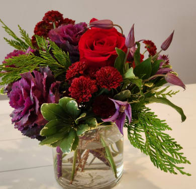 Centerpiece of reds and purples