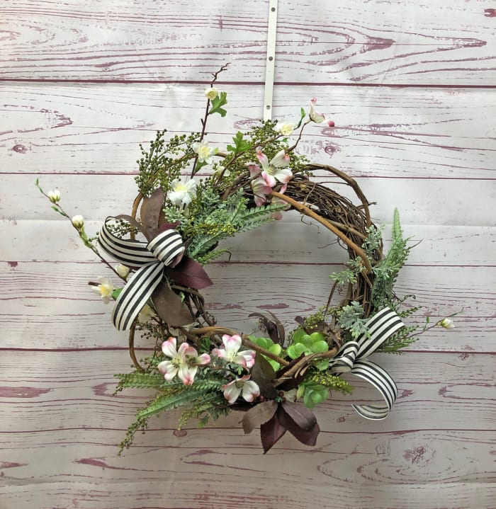 Woodsy and Whimsical Grapevine Wreath