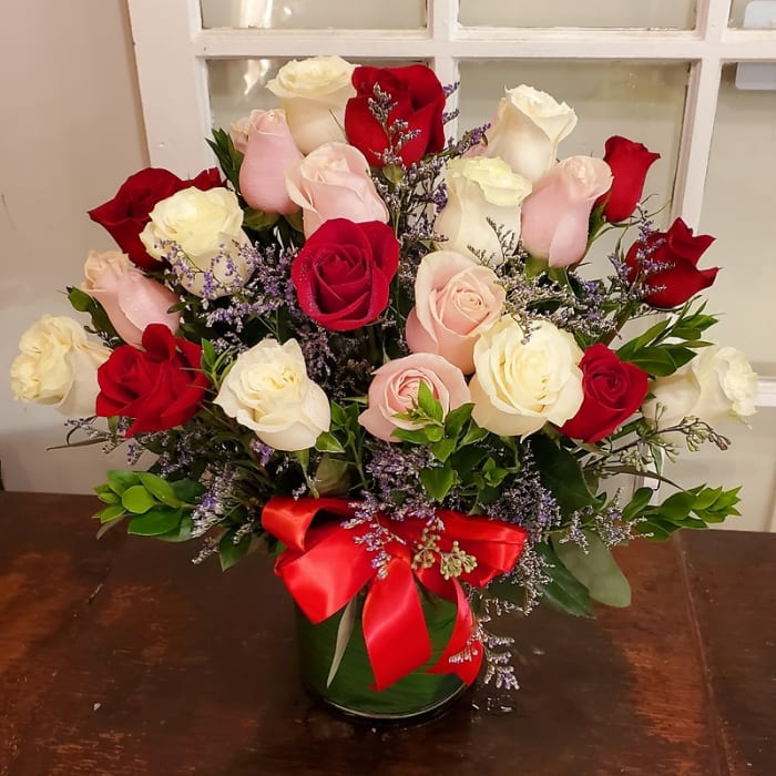 Two Dozen (24) Pink, White & Red Roses Vased