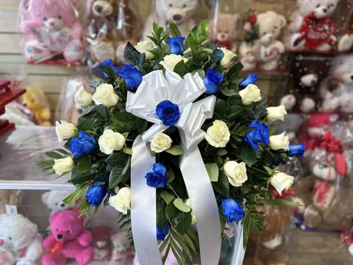 BLUE AND WHITE ROSES CASKET