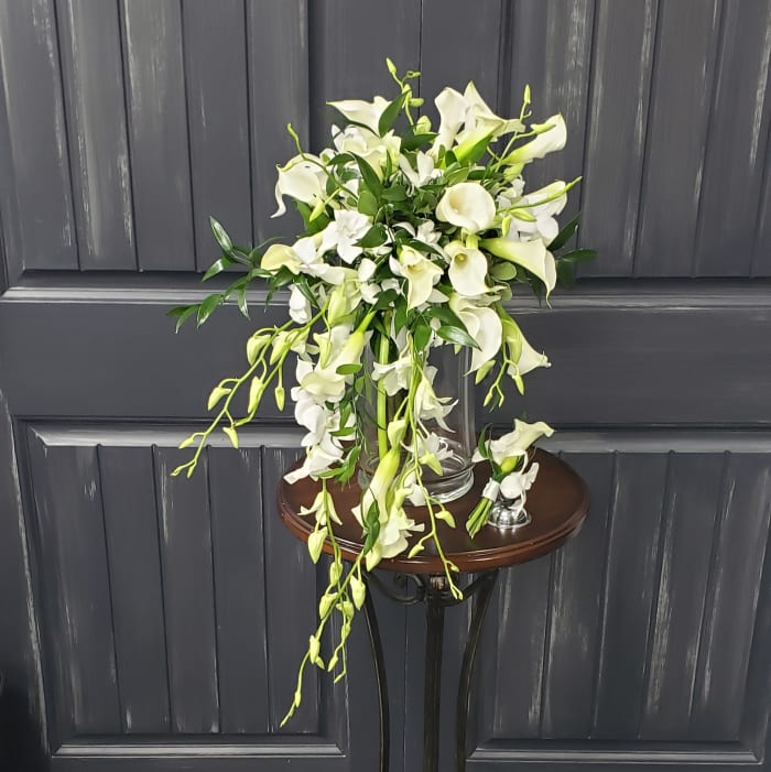 Calla Lily and Dendrobium Cascade Bouquet and Boutonniere