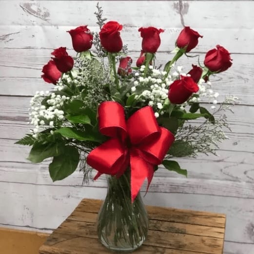 Red Roses in Clear Vase