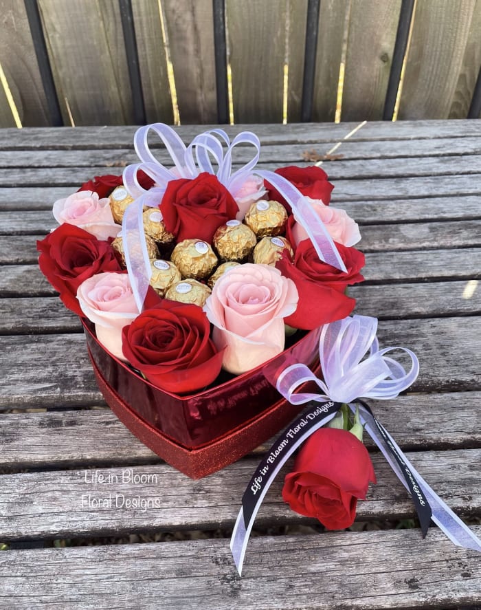 Boxed heart roses and chocolates