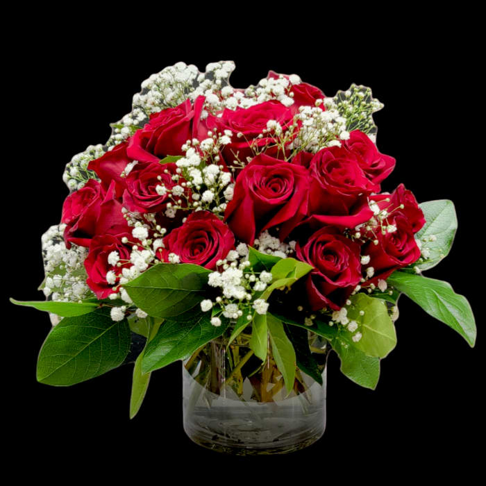 RED ROSES IN SHORT VASE