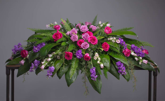 Magenta Reverence Casket Spray