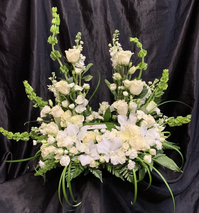 U  #2.   A U shaped floral surrounds your loved ones urn