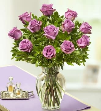 Purple Roses in Clear Vase