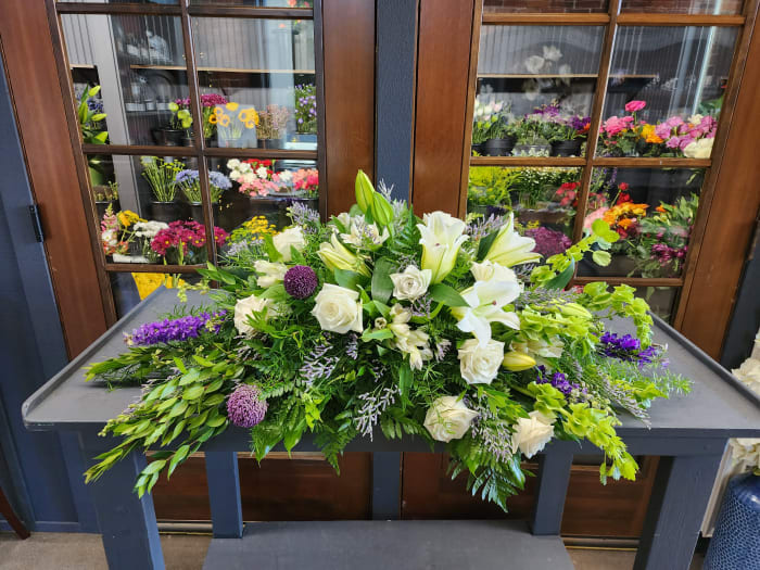 Resurrection Casket Spray With Purple