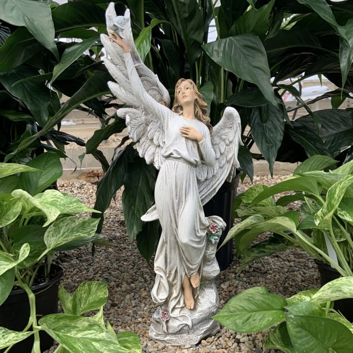 Angel Holding Dove