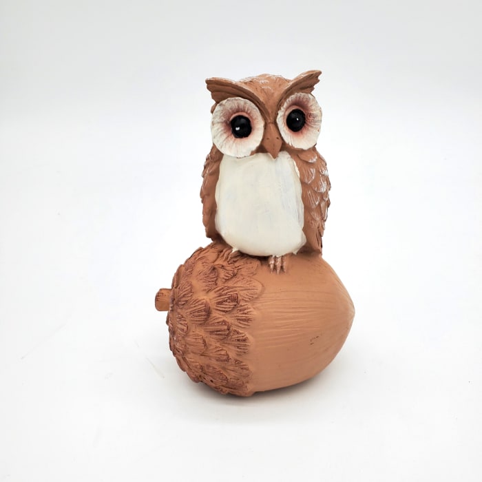 Little Owls Sitting on Autumn