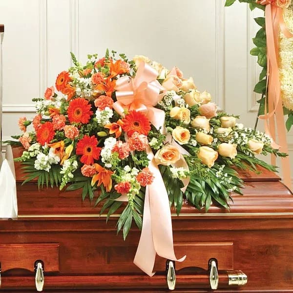 Peach and Orange Casket Spray