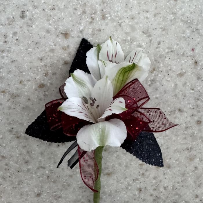 White Alstroemeria Boutonniere w/Black & Burgundy Accents