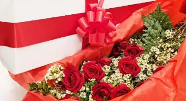 BOX OF LONG STEMMED ROSES WITH BOW
FLOWER ARRANGEMENT