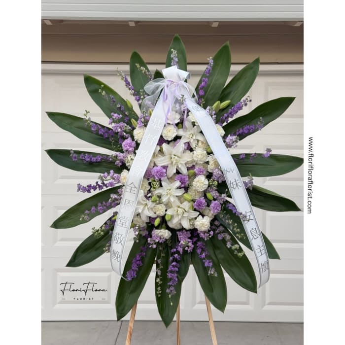 White Lilies and Purple Carnations Standing Spray
