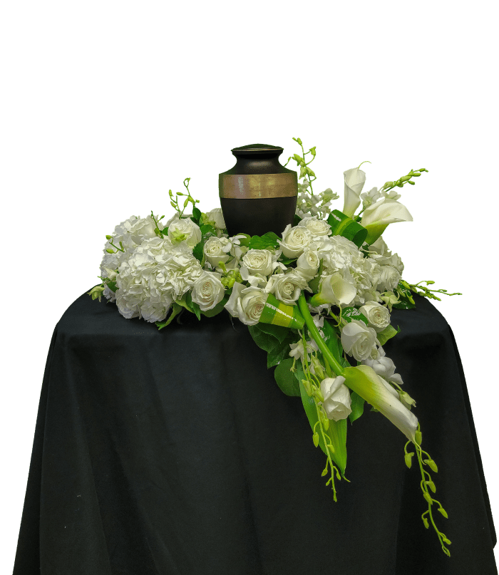 AU-7 Arreglo de urna en hortensias, orquí­deas, rosas y lirios cala