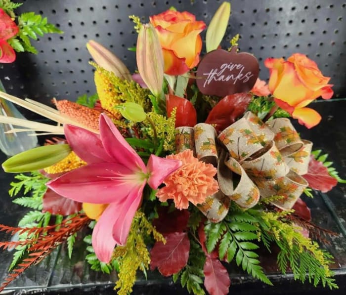 Seasonal Fresh Centerpiece in Holiday Container