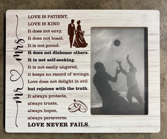 Love Never Fails Photo Frame